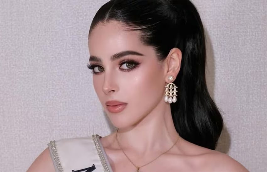 A closeup photo of Miss Universe Mexico, Fatima Bosch, with a sash and heavy makeup